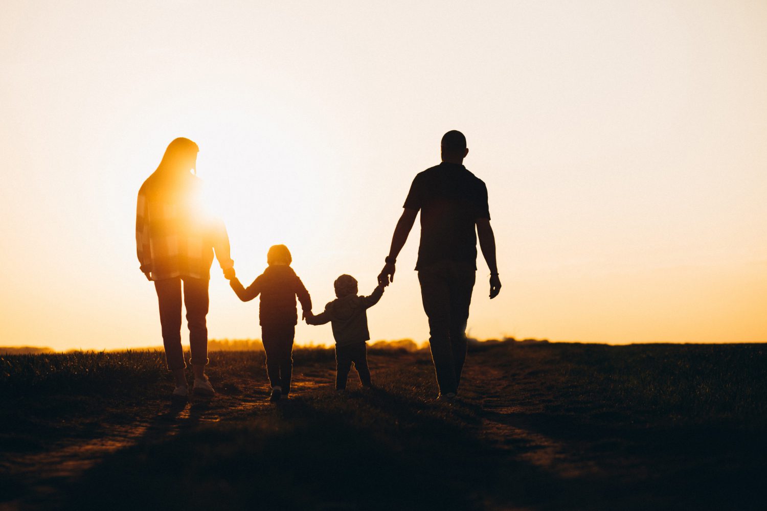 happy-family-silhouette-sunset